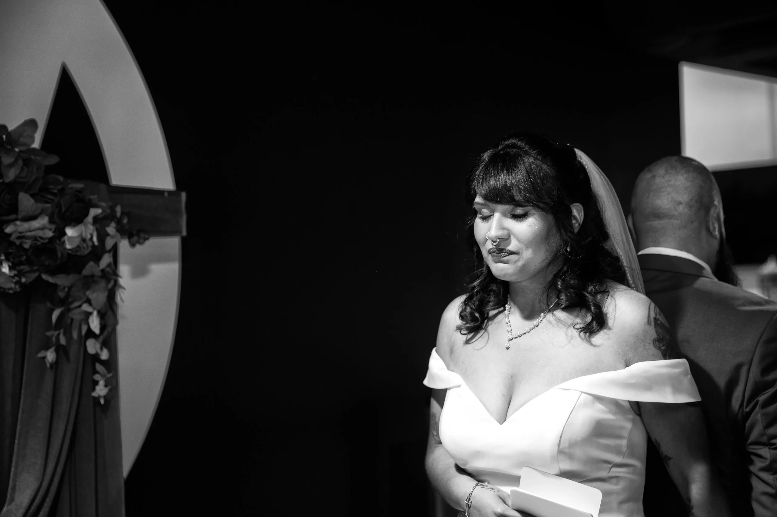 Bride at the ceremony, moody black and white